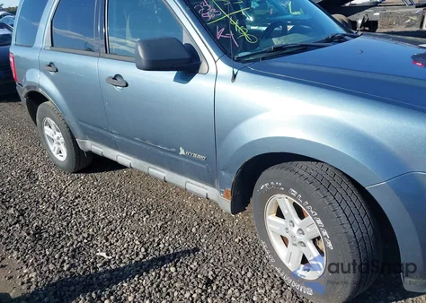 2011 Ford Escape Hybrid z USA, uszkodzony, nr VIN 1FMCU4K38BKA41334